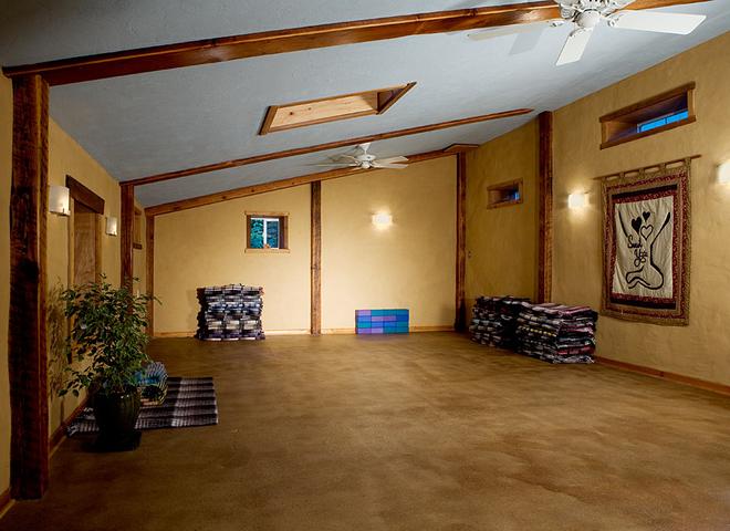 Sweet Yoga Studio room with yoga mats